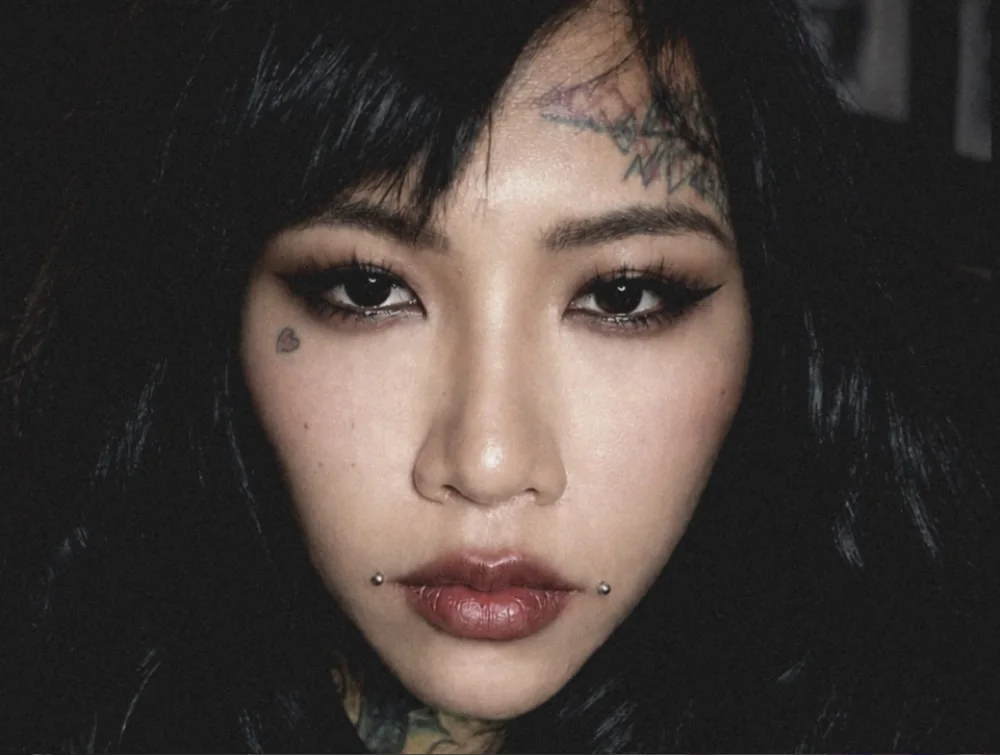 Close-up portrait of Gwen, female tattoo artist in Pattaya