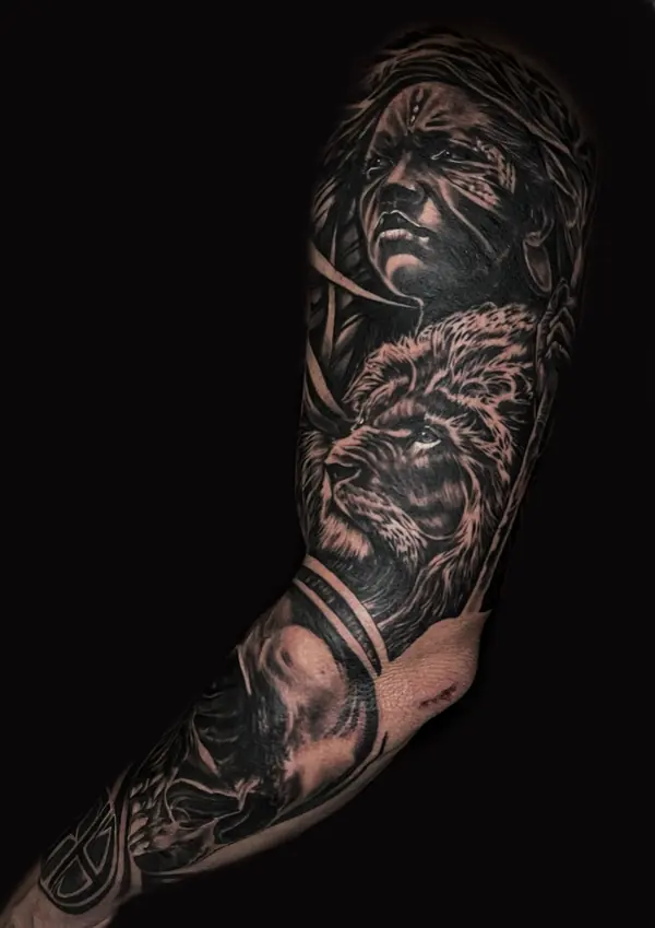 Realism tattoo by Gwen — woman portrait and lion full sleeve, black and grey