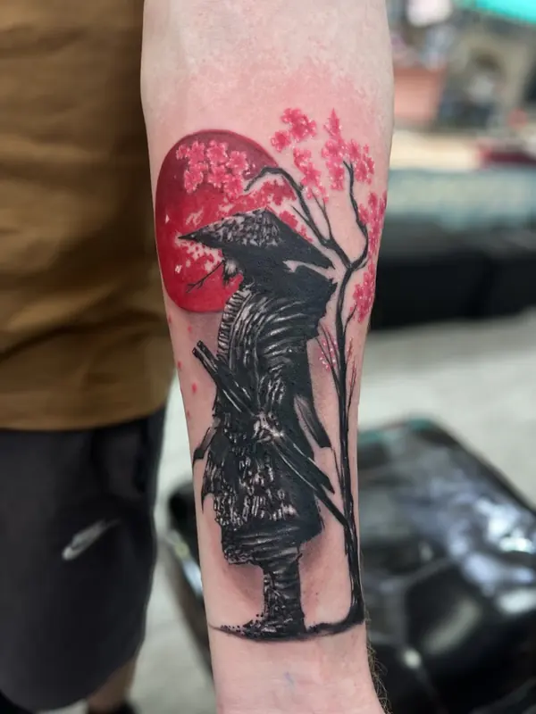 Realism tattoo by Gwen — samurai with red sun colour realism, Pattaya tattoo studio