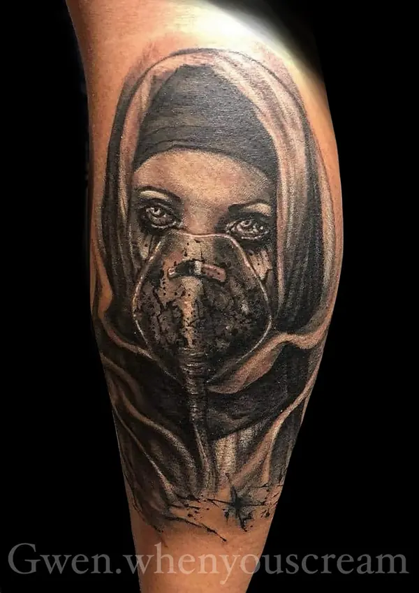 Realism tattoo by Gwen — hooded portrait tattoo, black and grey, Pattaya tattoo studio